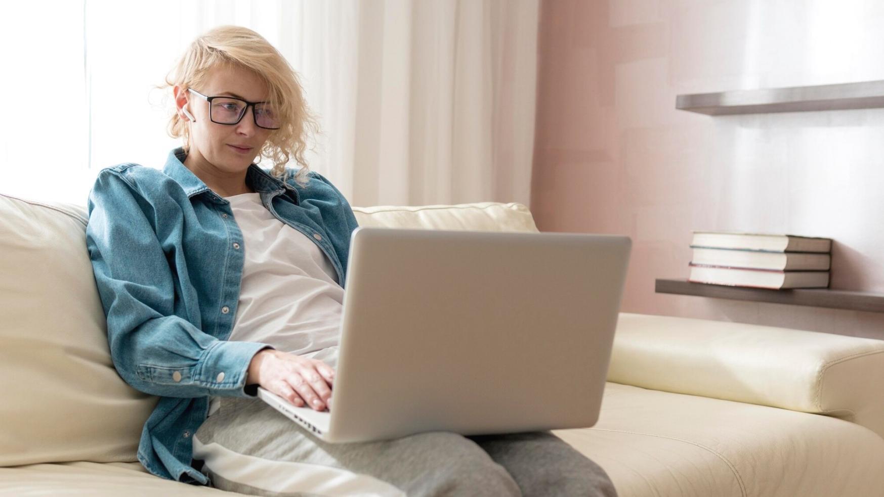 Person reviewing financial documents and planning budget goals